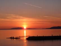 SUNSETS THE EASY WAY: You don't have to go for a hike to enjoy a sunset. Willingdon Beach offers up some beauties. But where's the challenge in that? (Photo by Sean Percy)